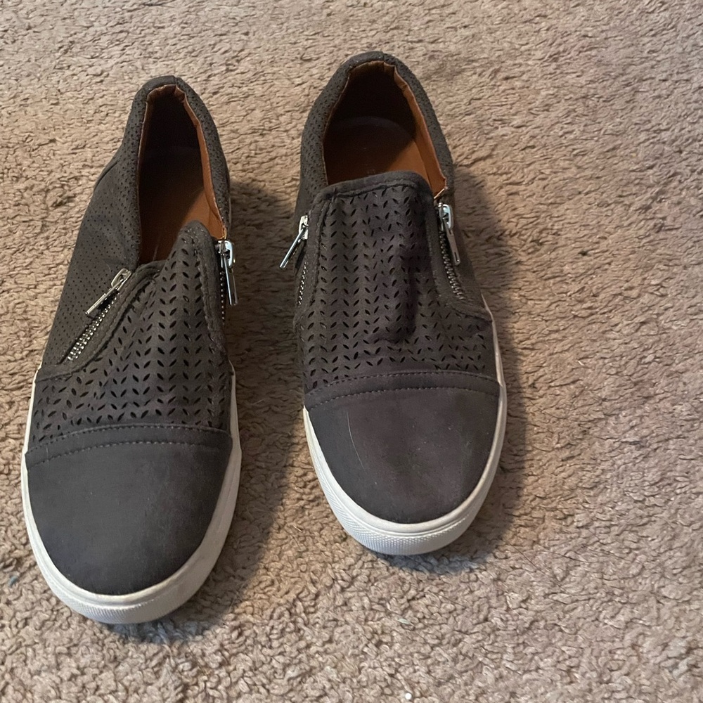 Report brown shoes with zippers. Size 8